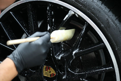 Cleaning alloy wheel spokes with the Sponge Guru oval wheel detailer