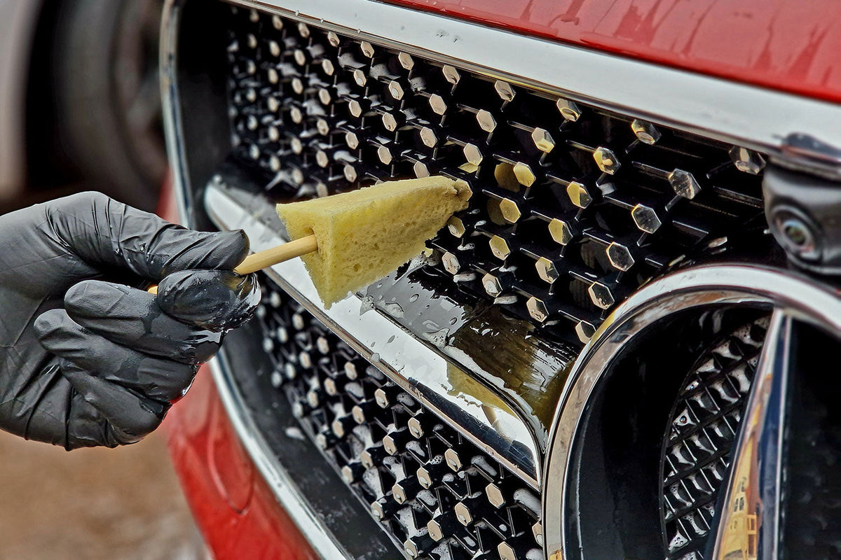 Cleaning car interior with the Sponge Guru Tri-Edge Detailer